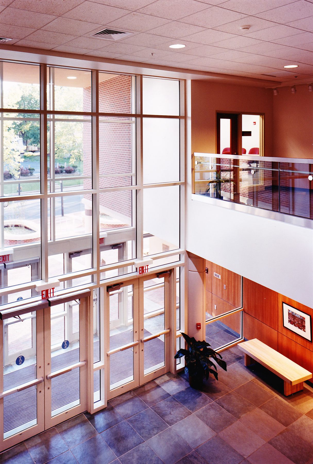 Bright multi-level community interior with clerestory light